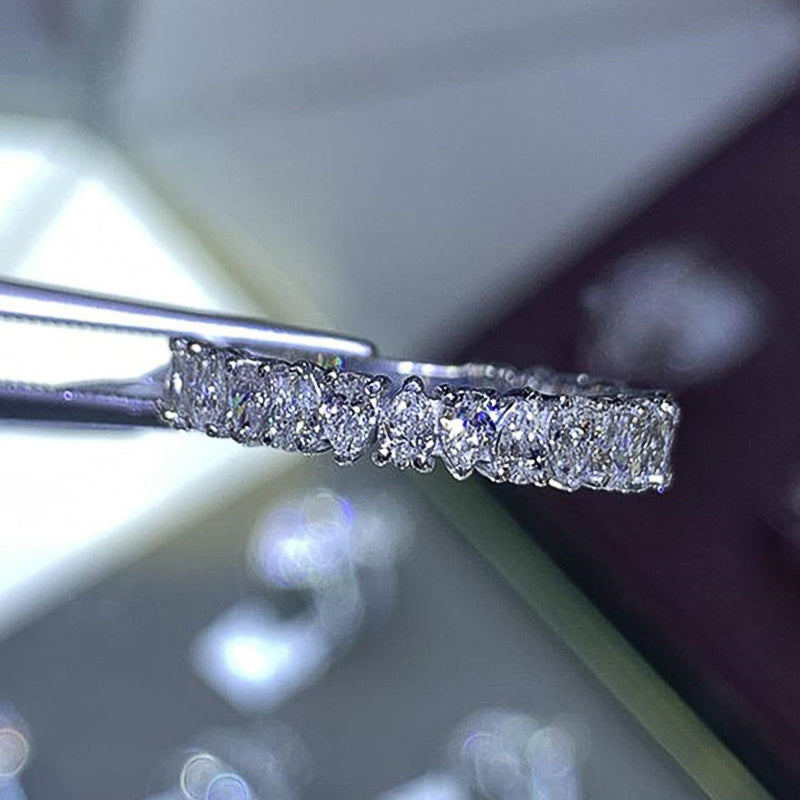 Anello di lusso con gocce d'acqua intarsiata